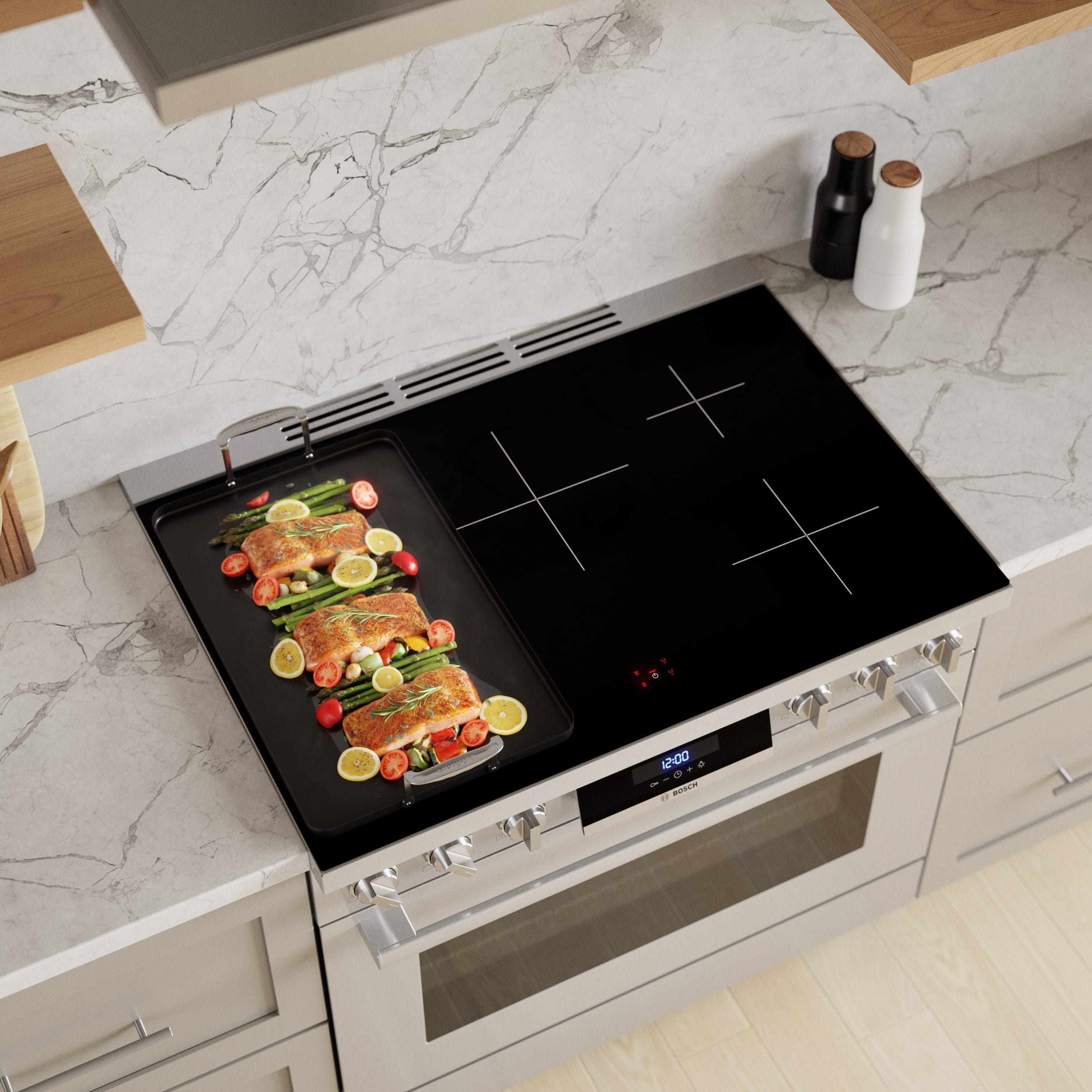 Combine two elements into one larger cooking zone with CombiZone which accommodates larger pans