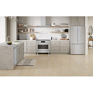 The pedestal feet, heavy-duty knobs, and edge-to-edge glass design delivers an industrial-chic aesthetic that fits with a range of kitchen styles