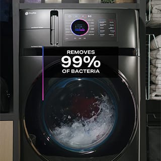 A front-facing shot of an ongoing wash cycle. A caption in the image reads "Removes 99% of Bacteria" A front-facing shot of an ongoing wash cycle. A caption in the image reads "Removes 99% of Bacteria"